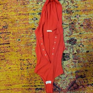 Red bodysuit with a hood, brand new